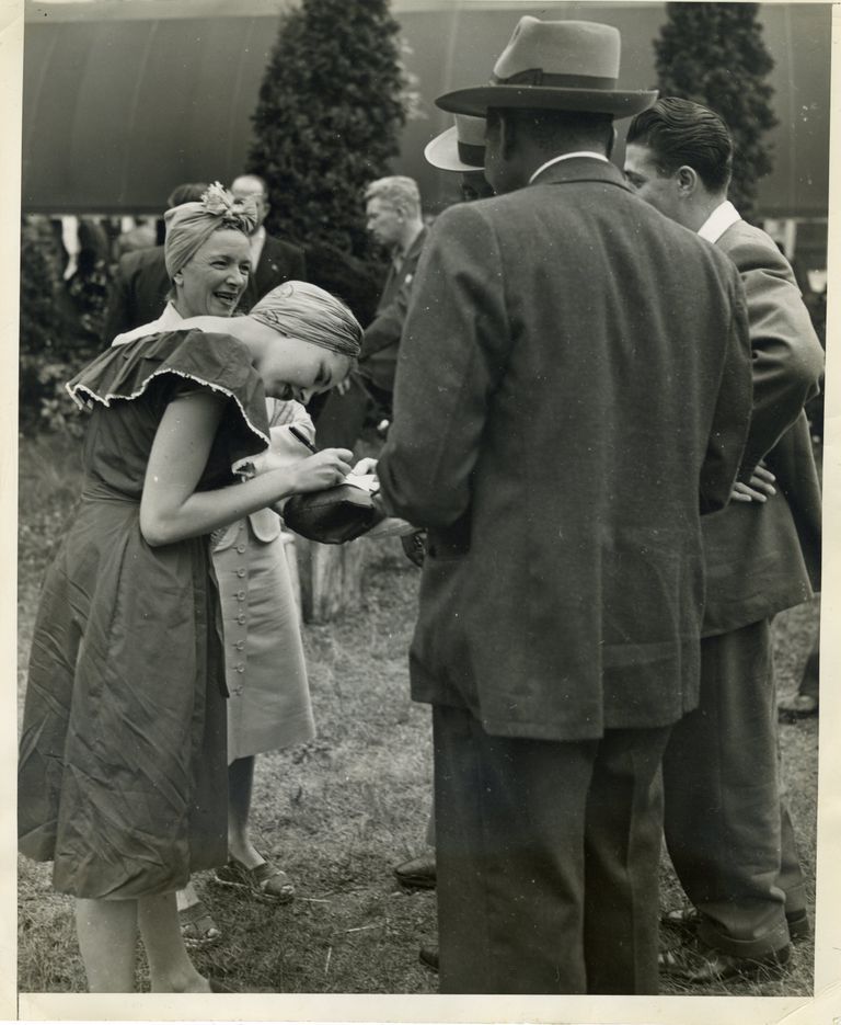          Red Cross: Mary MacArthur writing and Red Cross Event, 1946 picture number 1
   