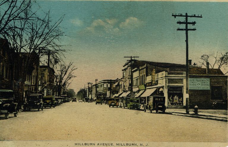          Color postcard, unused; View of Millburn Avenue c. 1928 shows two-way traffic.
   