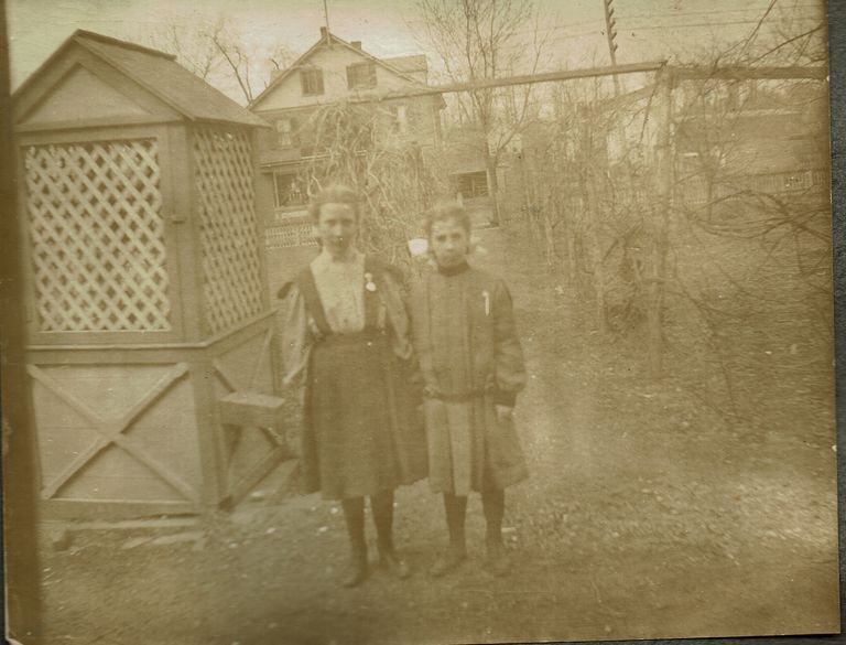          Marshall-Schmidt Album: Two Girls Standing Near Path, House Behind picture number 1
   