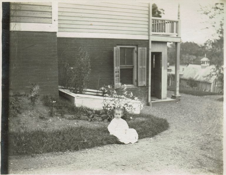          Marshall-Schmidt Album: Baby Seated Outside a House picture number 1
   