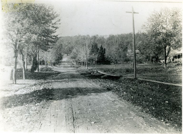          Looking up Linden Street, undated. Wyoming avenue crosses at center of the photo. Wyoming Church just out of the picture. Hard dirt road with sidewalk.; Photo ID # 401
   