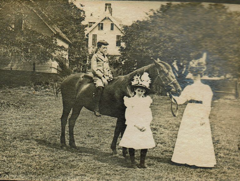          Marshall-Schmidt Album: Woman in White Leading Horse with Boy, Girl standing picture number 1
   