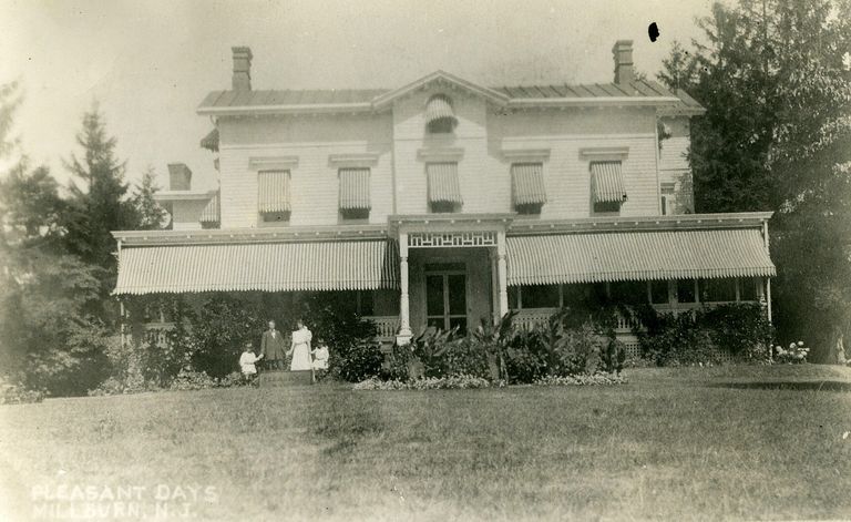          Pictured are: Mr. Joseph P. Day, his wife, son and daughter; Image ID # 408, From a Post Card
   