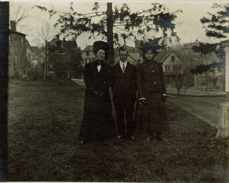          Marshall-Schmidt Album: Two Girls and Young Man Standing Outside picture number 1
   