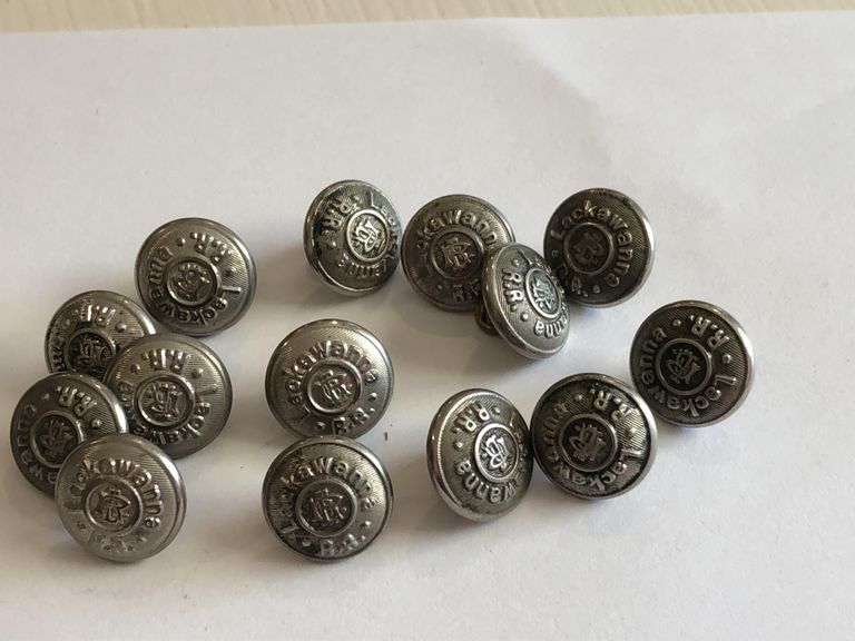          14 silver-colored buttons
   