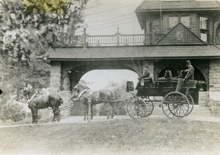          Two coachmen have the carriage & four coal black horses ready for a ride.; Image ID #413
   