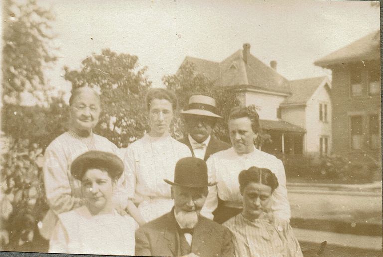          Marshall-Schmidt Album: Family with Neighborhood Houses Behind picture number 1
   