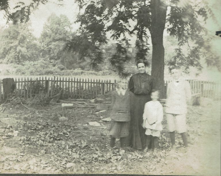          Marshall-Schmidt Album: Family Standing Under a Tree picture number 1
   
