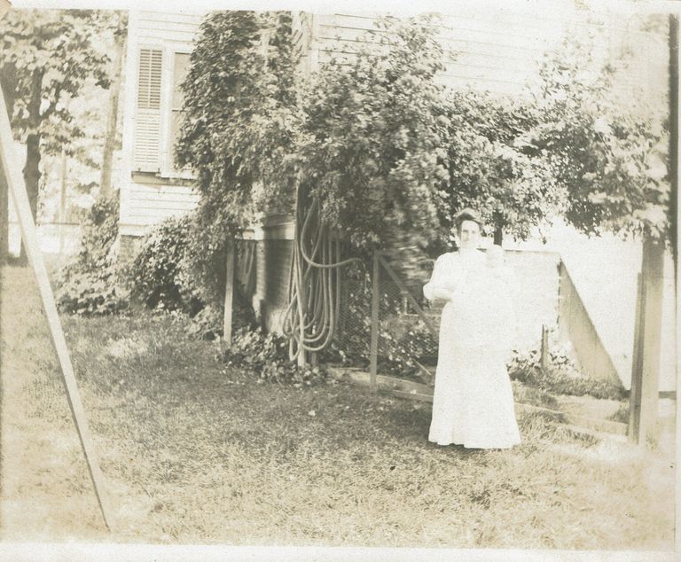          Marshall-Schmidt Album: Woman and Baby in Yard picture number 1
   