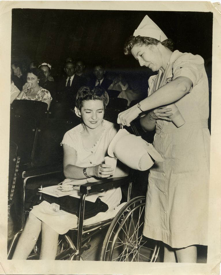          Red Cross: Anita Bloom Receiving Punch at Red Cross event, 1946 picture number 1
   