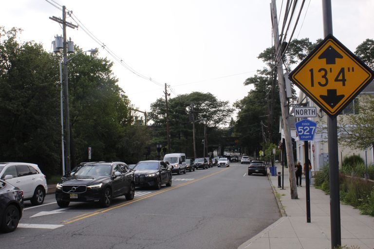          Main Street Millburn looking north. Town Parking Lot and Paper Mill Playhouse Studios on the right.
   