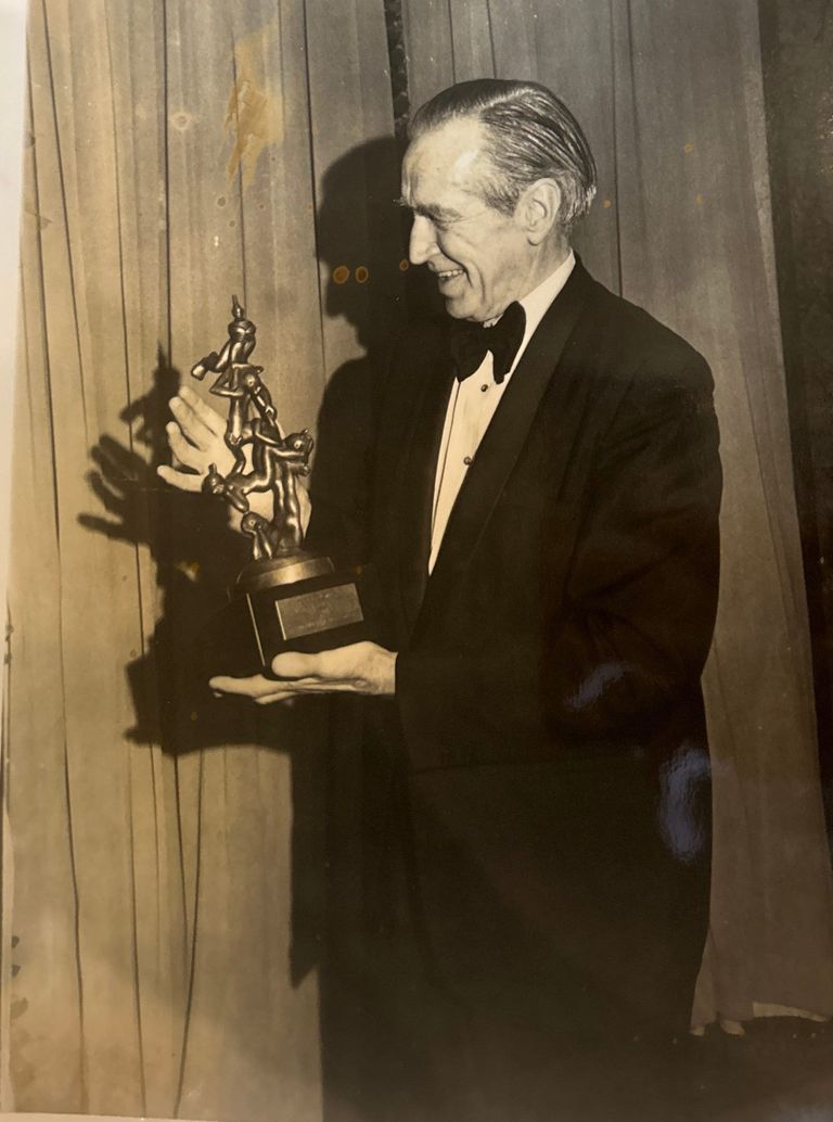          Dunn: Bob Dunn with Ruben Award, 1975 picture number 1
   