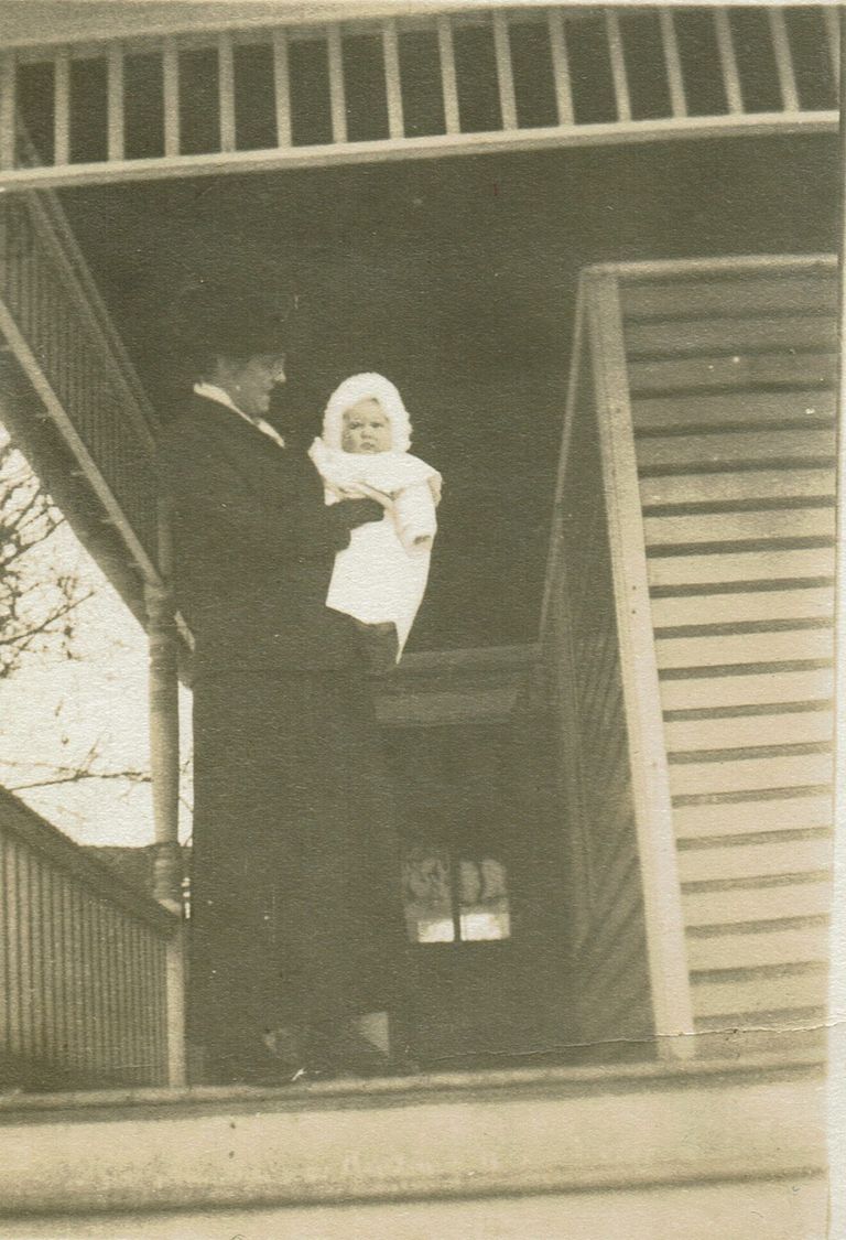          Marshall-Schmidt Album: Woman on Porch Holding a Baby picture number 1
   