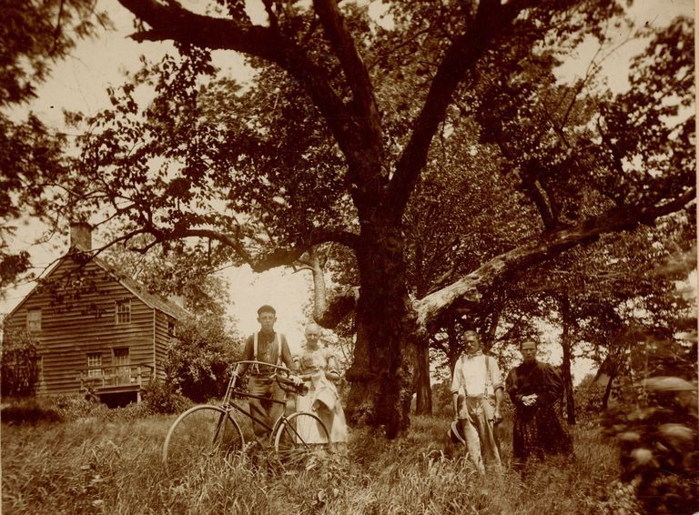          Bosworth: Unidentified Family Outside Wooden House and Bicycle, c. 1900 picture number 1
   