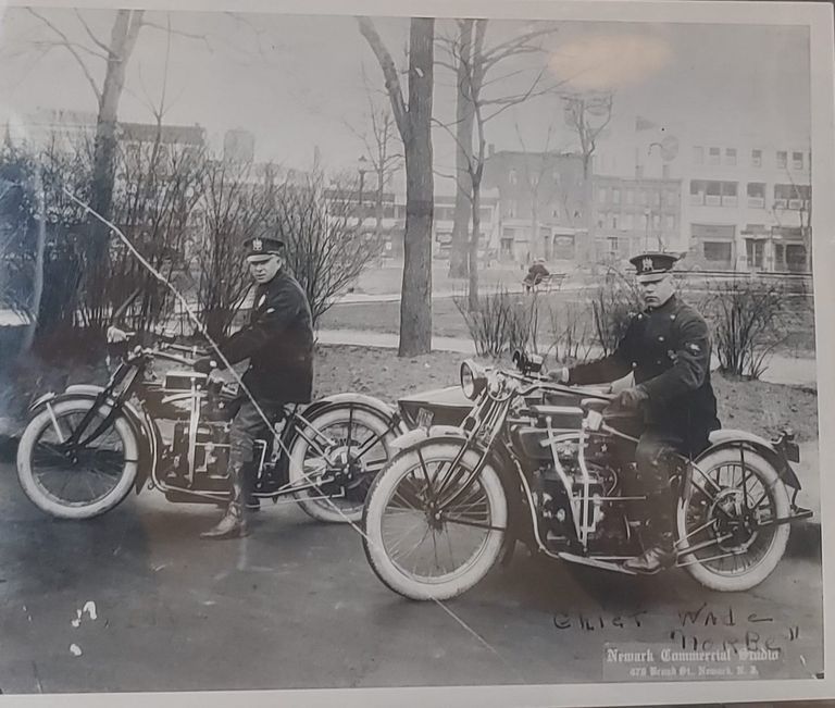          Fire Department: Fire Chief Wade and Another Firefighters on motorbikes outside of a park picture number 1
   