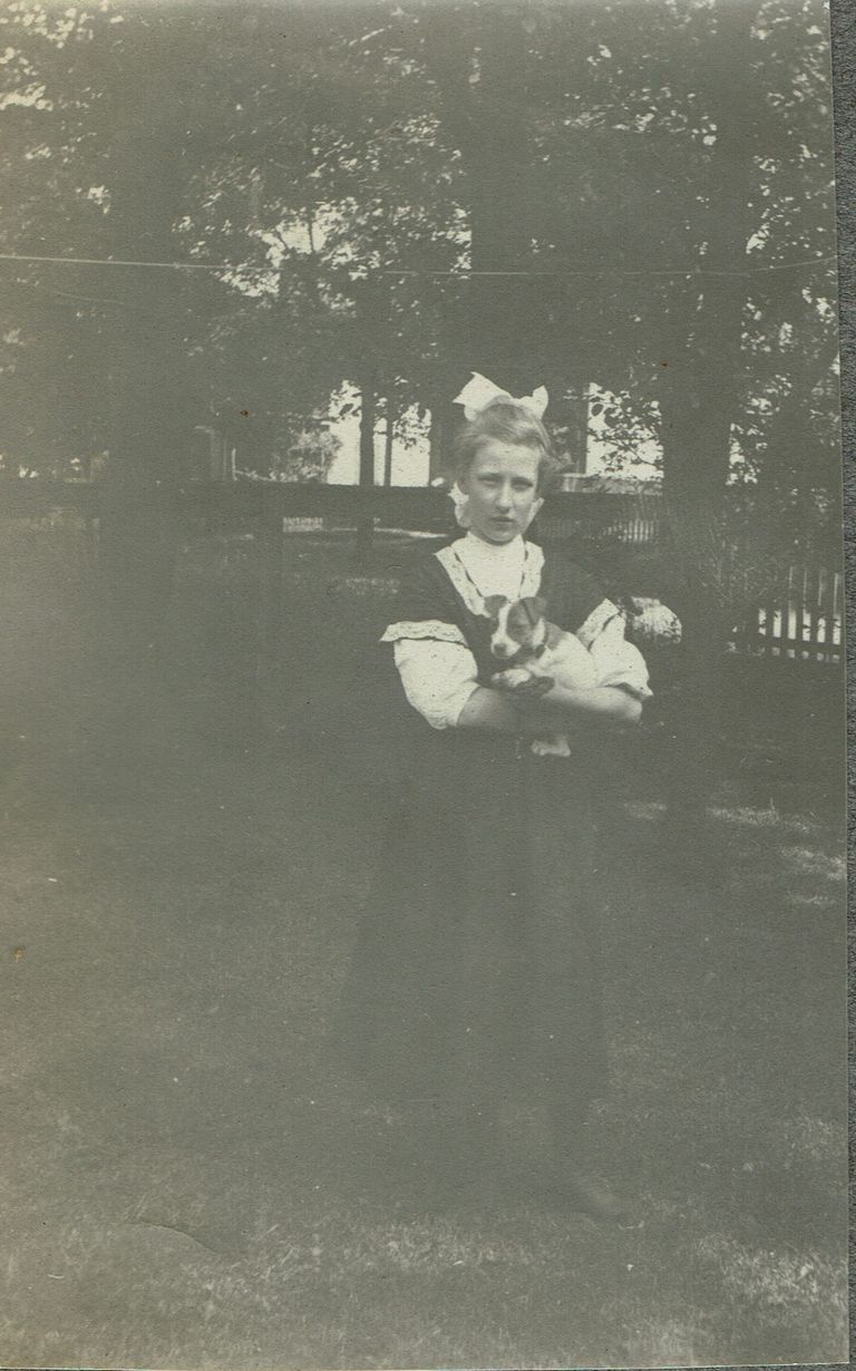          Marshall-Schmidt Album: Margaret Marshall Holding a Puppy picture number 1
   