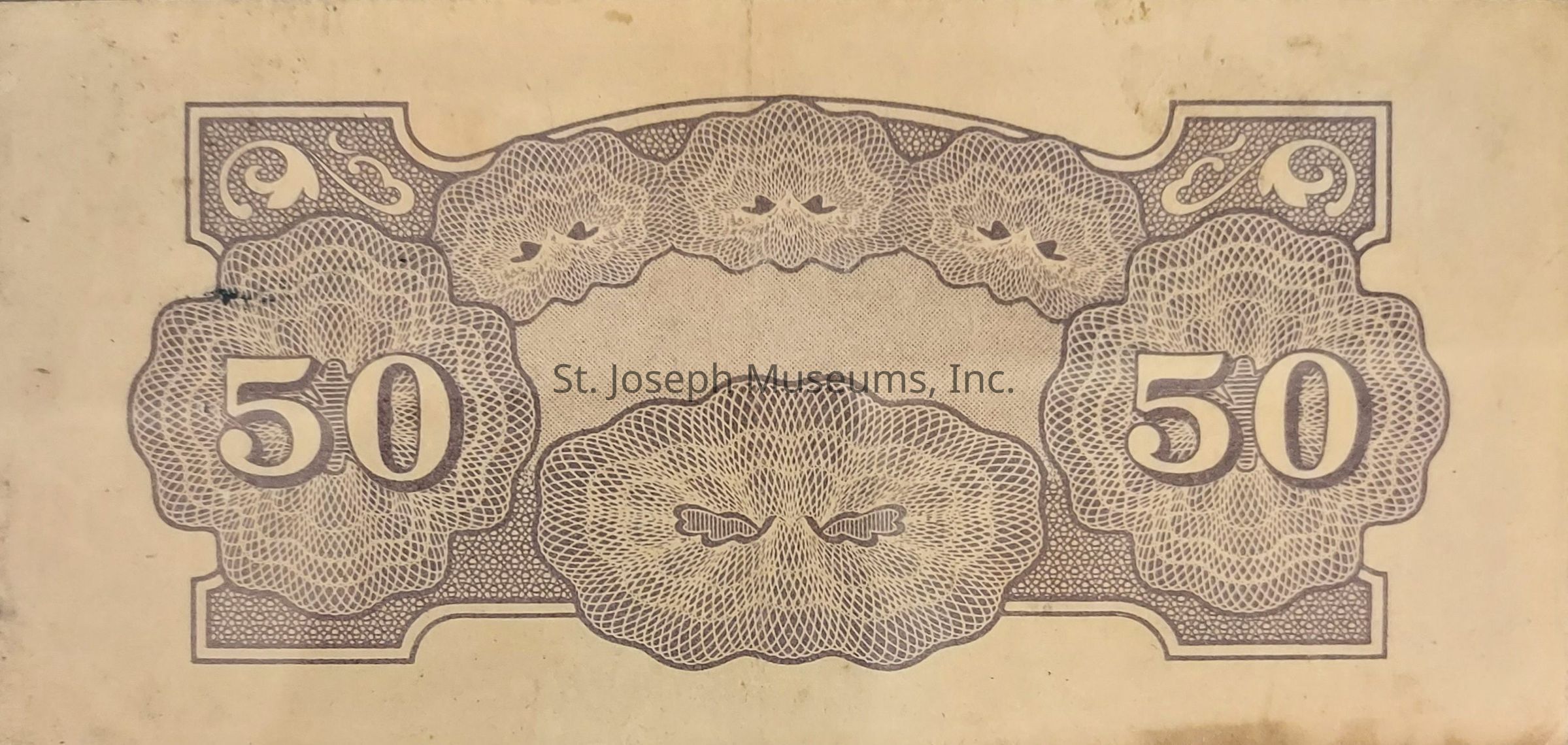 The image features an ornate and intricately designed currency note, prominently marked with the number "50" on both the left and right sides. The background is composed of an elaborate pattern featuring geometric and floral elements, creating a highly detailed and textured appearance. This pattern is symmetrical, with curved shapes and decorative scrolls seamlessly merging into one another, showcasing a traditional style often associated with vintage banknote artistry. The overall tone of the image is beige, giving it a classic and aged look, reminiscent of older currency designs. The intricate details suggest security features typical of banknotes, aiming to prevent counterfeiting while simultaneously adding aesthetic appeal. The symmetry of the design, combined with the central focus on the large numbers, clearly indicates the denomination of the note, emphasizing its importance and value.
