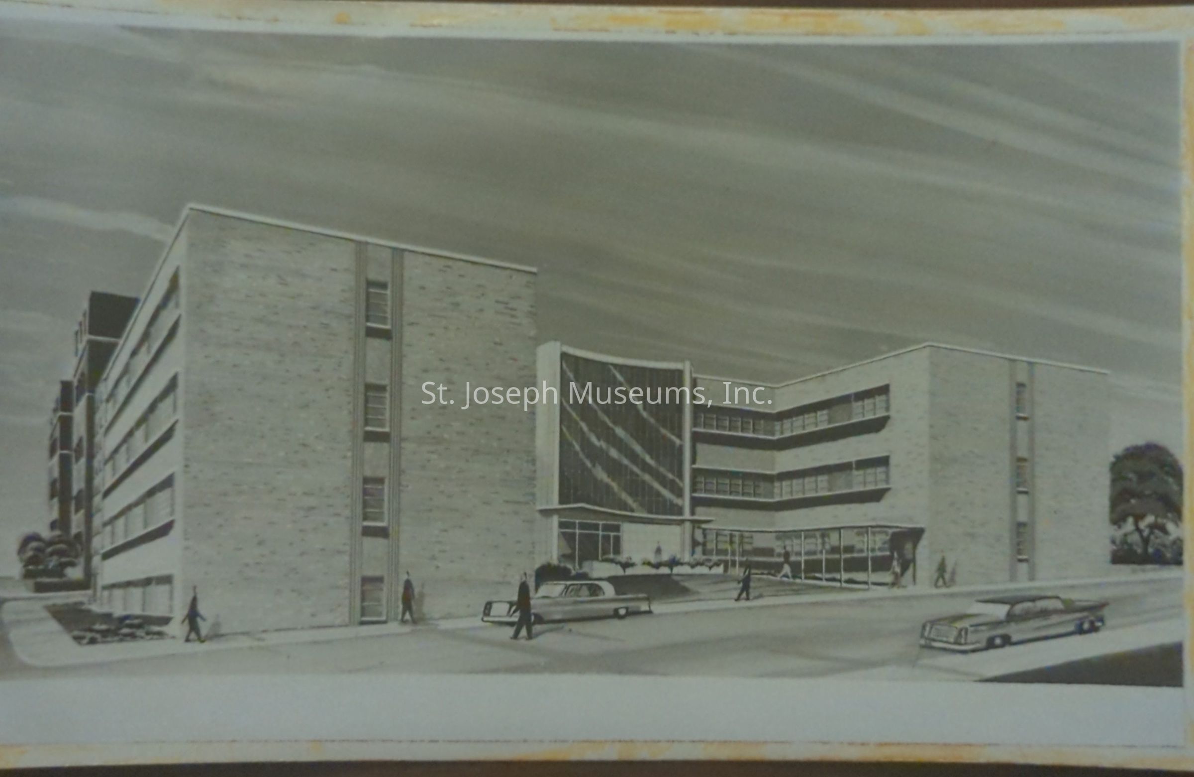 Black-and-white artist's rendition of the east entrance of a new addition to the Methodist Hospital, showcasing a modern architectural design with clean lines and large windows. Several people and vintage cars are visible in front of the multi-story brick building, providing a sense of scale and activity on 7th Street, between Faraon and Robidoux street.