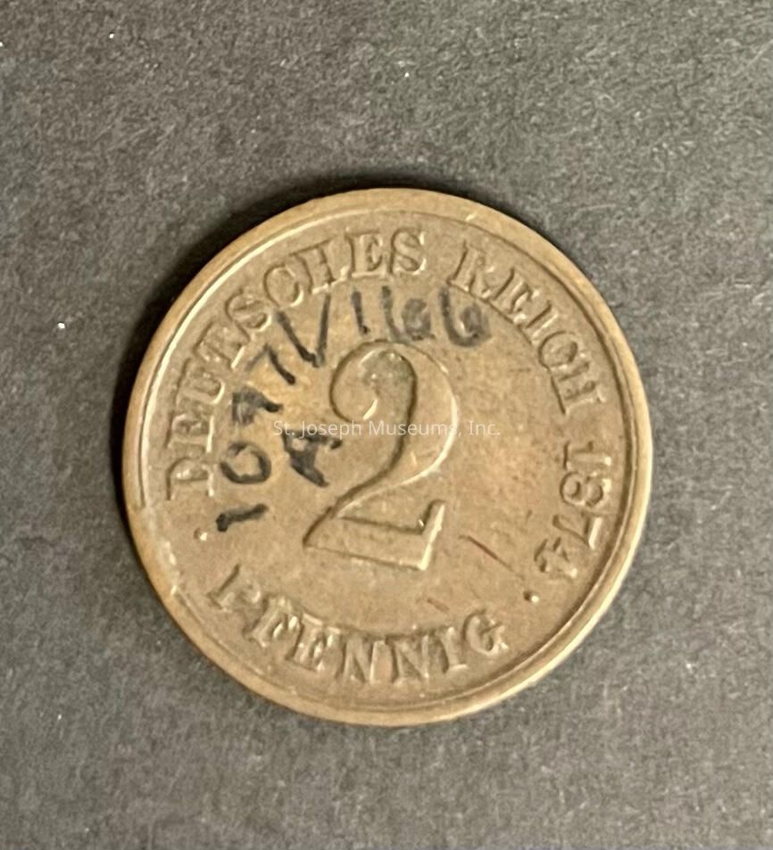 The image shows an old coin resting on a dark surface, with the text "DEUTSCHES REICH" and the number "2" prominently displayed in the center, indicating its denomination of two pfennig; the year "1874" is also clearly marked along the right edge of the coin, which suggests its historical significance and origin from Germany; the surface of the coin exhibits wear and patina, indicative of its age, reflecting not only its monetary value but also its cultural and historical relevance during the time it was in circulation, offering a tangible connection to the past and a piece of numismatic history that could interest collectors, historians, or enthusiasts of antique currency, providing insight into the economic conditions and design elements prevalent during the late 19th century in the German Empire.