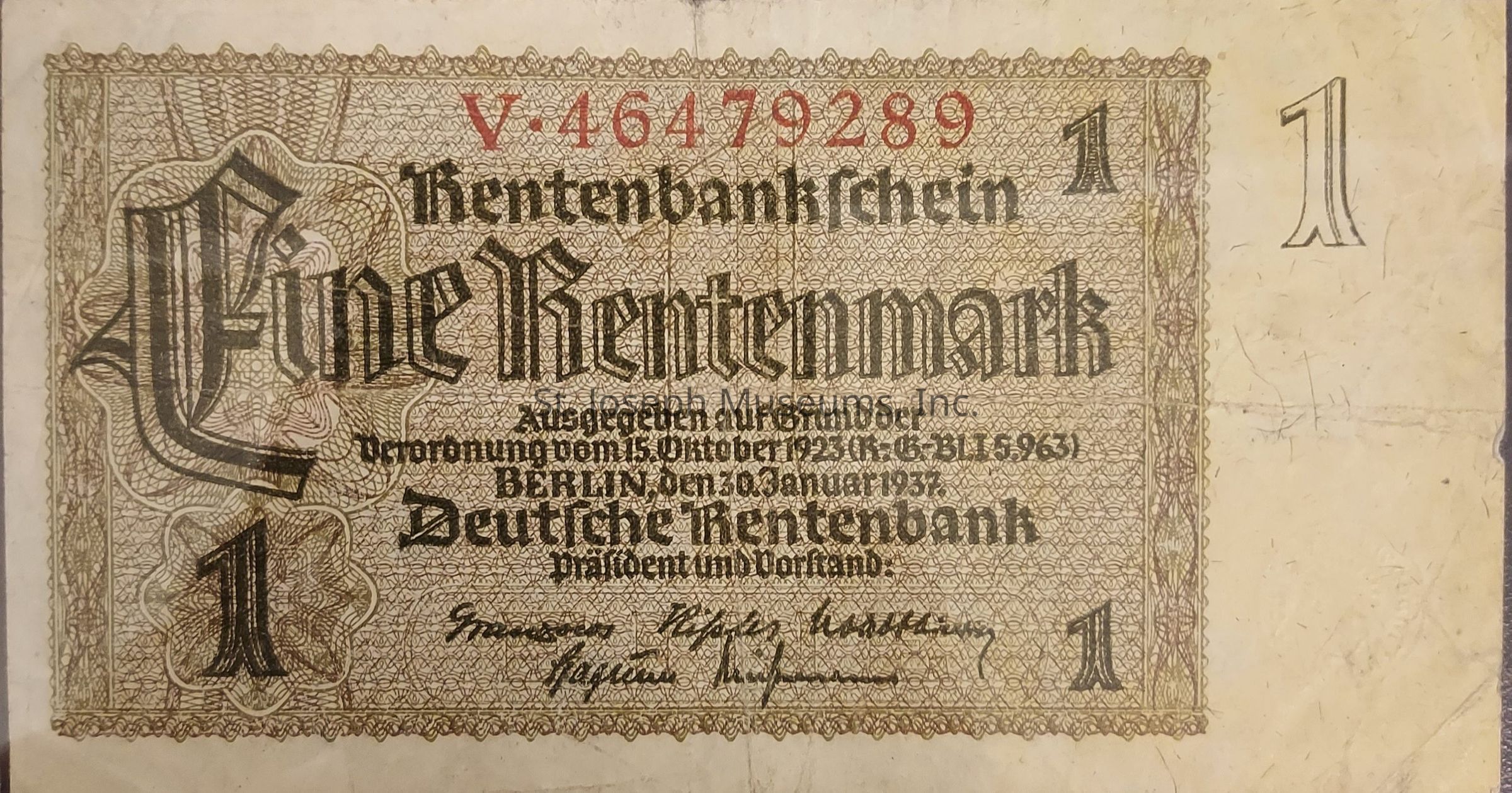 The image shows an old German currency note, specifically a "Rentenmark," distinguished by intricate patterns and detailed Gothic-style text. The numeral "1" appears prominently on both sides and in each corner, indicating its denomination. The top section displays a serial number printed in red ink, "V. 46479289," which adds to its authenticity. Below the central word "Eine Rentenmark," there is more text providing historical context, such as issuing authority details in German, with phrases like "Deutsche Rentenbank" and date references like "15 Oktober 1923" and "30 Januar 1937." The border features an ornate design, enhancing the antique aesthetic, while signatures at the bottom signify its legal tender status during its time.