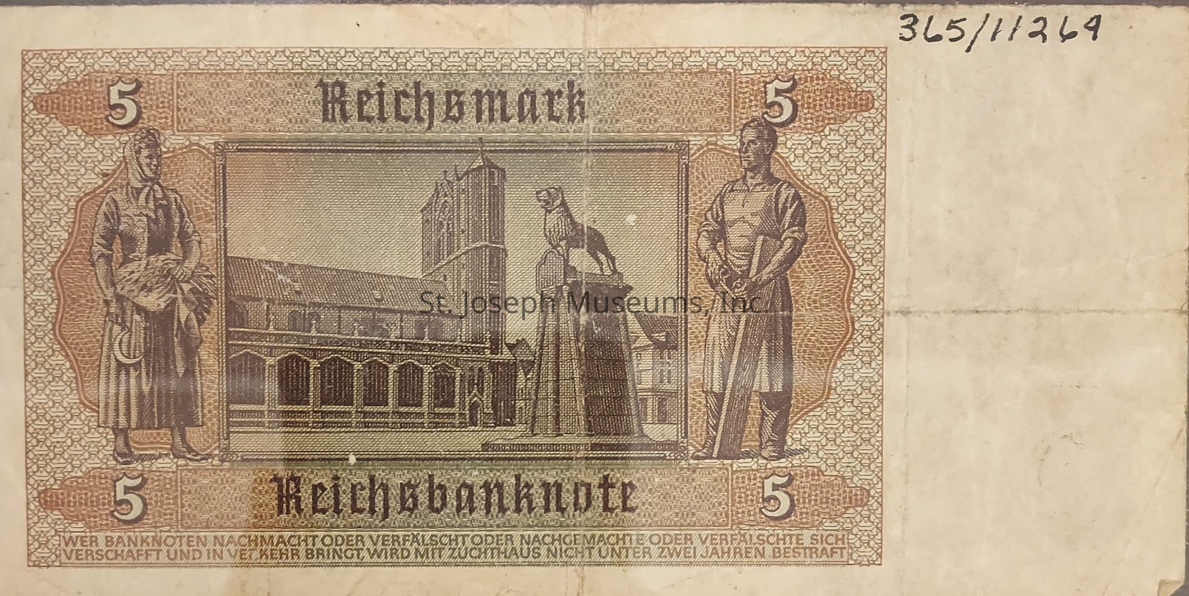 The image displays a vintage 5 Reichsmark banknote with intricate designs. On the note, there's a detailed depiction of a large cathedral or historic building, accompanied by two statues on either side. The left figure appears to be a woman holding a sheaf of wheat, symbolizing agriculture, while the right figure, possibly a man, holds a tool suggestive of industry or labor. In the center, a statue of an animal, possibly a dog, stands on a pedestal in front of a prominent architectural structure, possibly a church or a city hall with a towering spire. The banknote features decorative patterns throughout, with the denomination "5" prominently displayed in each corner, and the words "Reichsbanknote" written across the bottom.