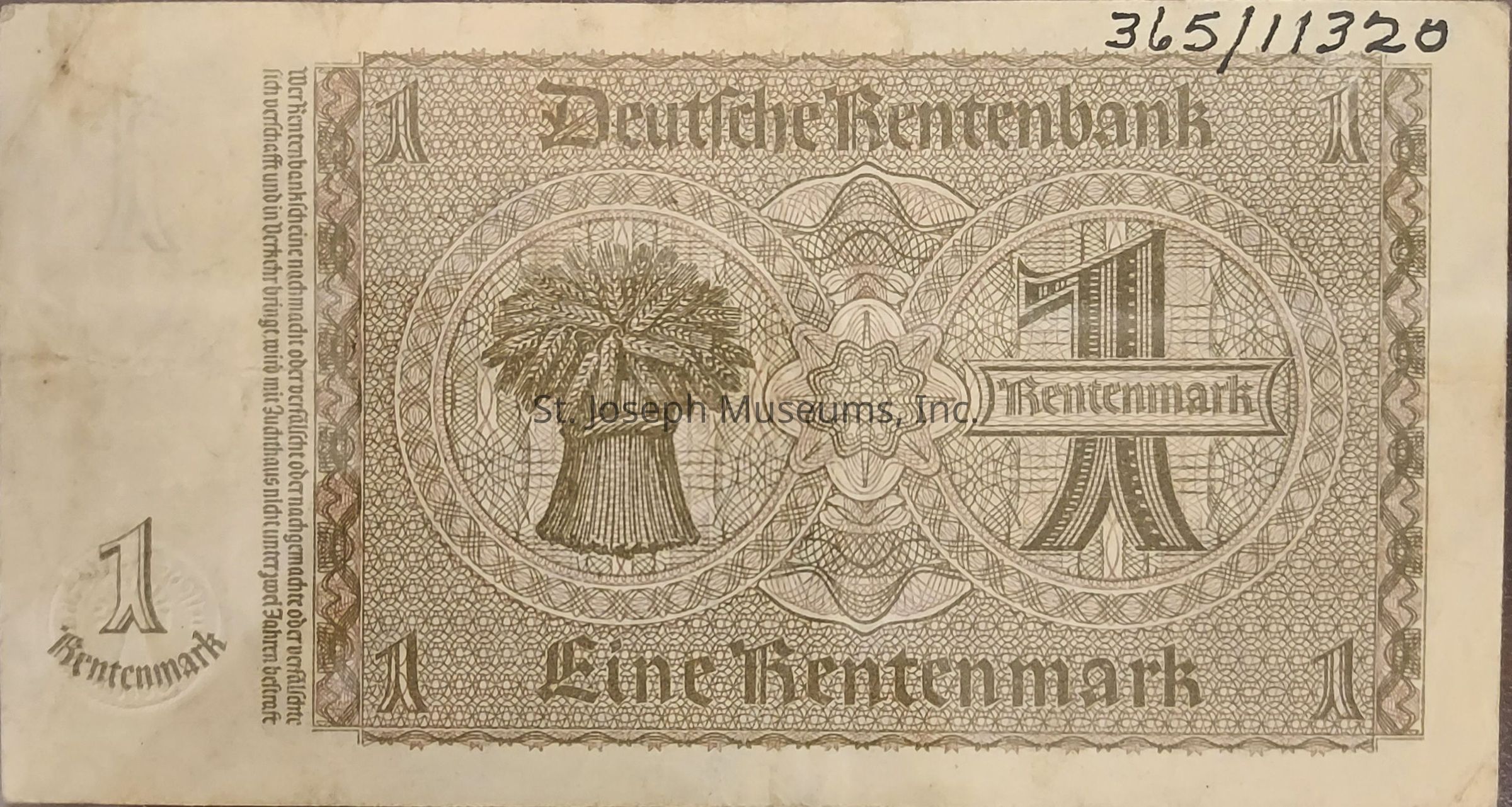 The image shows an old one Rentenmark banknote from the Deutsche Rentenbank, featuring intricate designs and patterns. A prominent circular frame contains a stylized "1" at the center, surrounded by detailed linework. On the left, there is an embossed number "1" and the word "Rentenmark" in a vertical arrangement. The background is a complex lattice of geometric patterns, enhancing the note's ornamental quality.