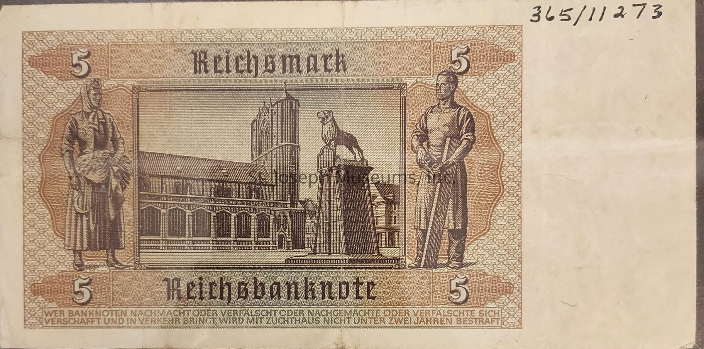 The image depicts a historical banknote labeled "Reichsmark," with the denomination of "5" displayed prominently in all corners. The design features intricate artwork, including two figures dressed in traditional attire on either side of a central vignette. The central illustration showcases a cathedral-like building with an adjacent statue of a lion perched on a tall pedestal, suggesting architectural significance. The backdrop combines detailed geometric patterns, contributing to the note’s artistic complexity. The word "Reichsbanknote" is prominently displayed at the bottom, and there are fine print warnings in German regarding the consequences of counterfeiting.
