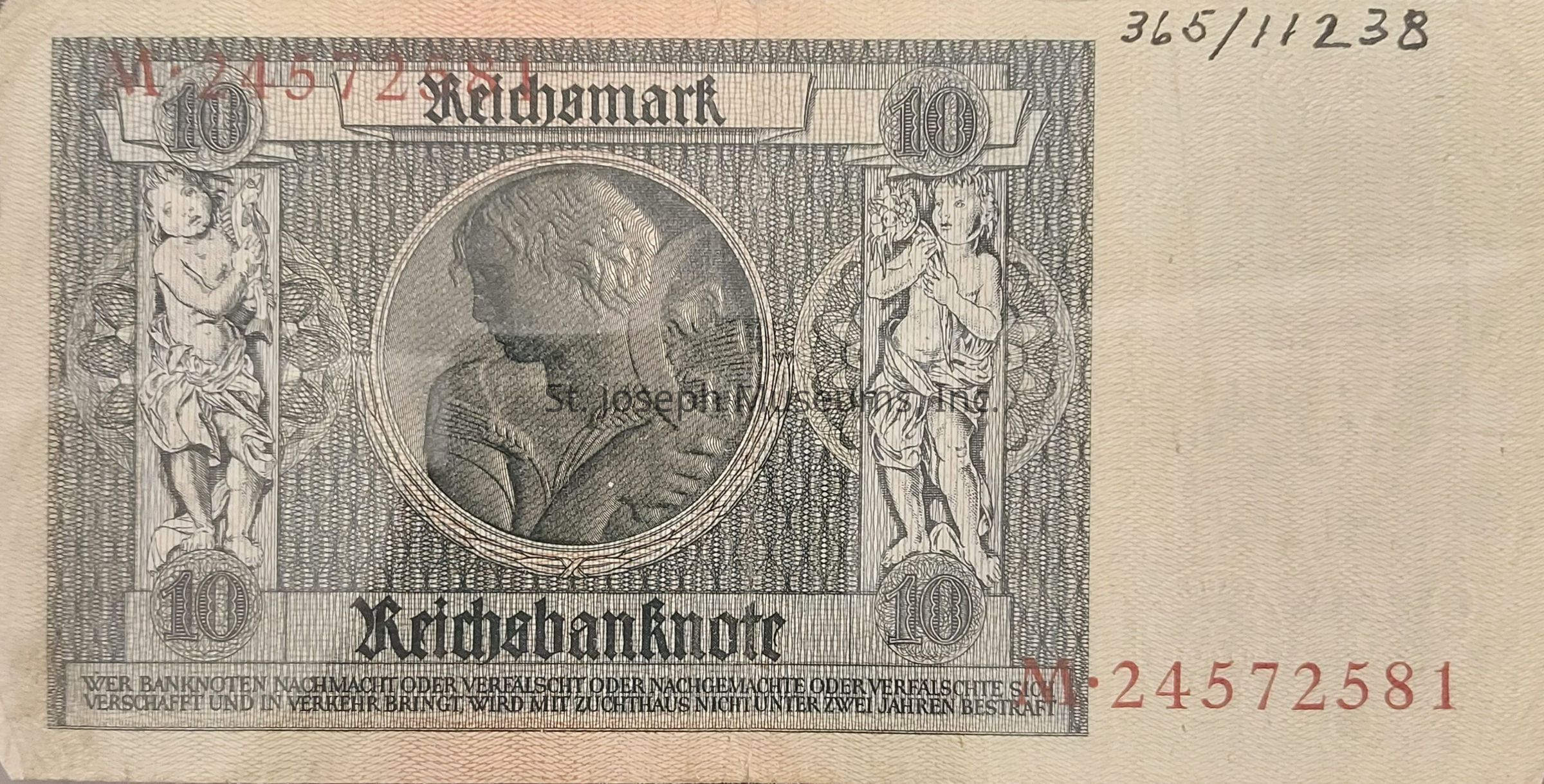 The image depicts a historical 10 Reichsmark banknote from Germany, showcasing elaborate and intricate artwork. The center features an ornate engraving with a central portrait of a person, framed by intricate patterns. On either side of the portrait, there are statuesque figures holding floral motifs, adding to the banknote's decorative elegance. The denomination "10" is prominently displayed in circles at each corner of the central design. The text "Reichsbanknote" is printed below the imagery, indicating the currency and its issuing authority. Serial numbers are visible in red, adding authenticity and security to the design. The banknote's artwork is rendered in monochrome, with detailed linework creating a sense of depth and texture. The border of the note consists of a detailed, repetitive geometric pattern, providing a visual frame that enhances the central elements. Additionally, there are inscriptions in German at the bottom, likely referencing legal or security information associated with the note's issuance and use. The overall composition of the bank