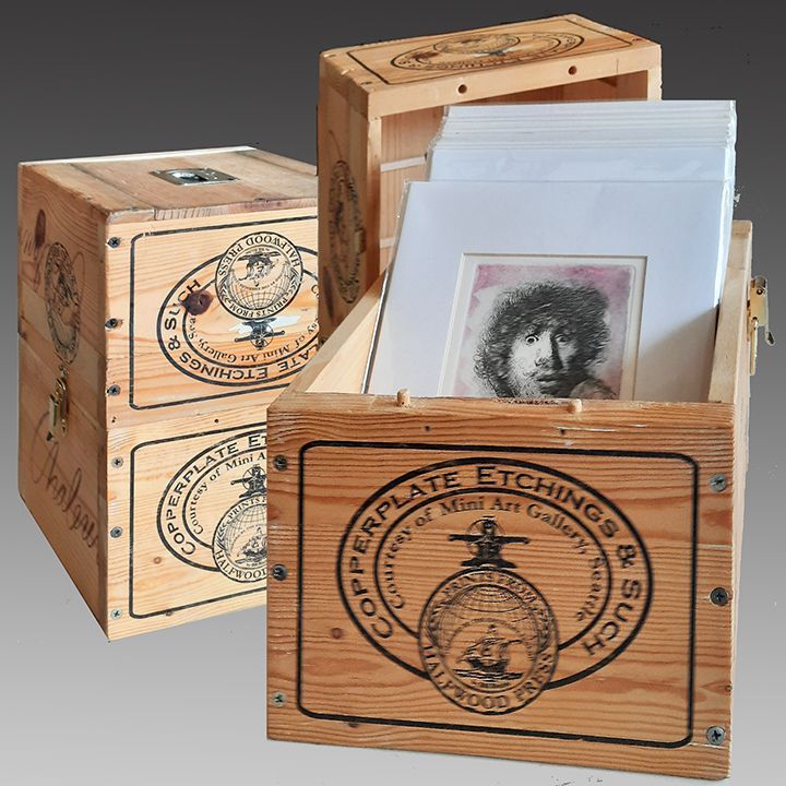 Boxed Prints, closed and open: The pine boxes were made from a wine crate cut to size to accommodate matted works on paper in 8 X 10 mats. The stamping spelled out the theme made up by Ethan Lind for his Pike Place Market booth, and includes reference to the Mini Art Gallery where it was made and which now contains Bill Ritchie's works.