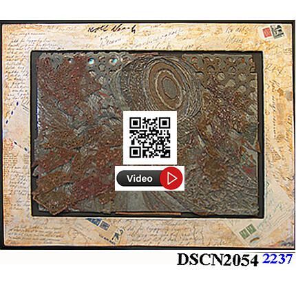 Metal Graphic Printing Plate after Rolf Nesch: Printing plate for "Target and Road" made in Rolf Nesch's studio by Bill Ritchie, following Nesch's direction teaching Ritchie how to use his unique "metal graphic" printing plate method. The plate is mounted within a frame plastered with fragmented copies of Nesch's handwritten letters - including stamps from Norway - as Ritchie was making plans to travel to Norway in 1969.