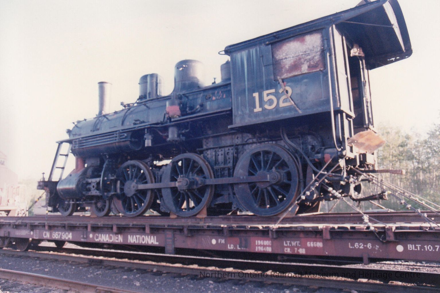 Photograph - Canadian National Steam Locomotive 152 being transported ...