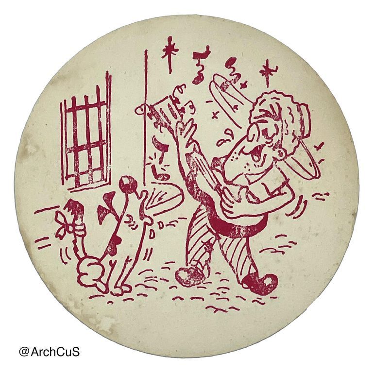 Circular coaster with design of a cartoon drunken man singing to a stray dog, printed in red ink.