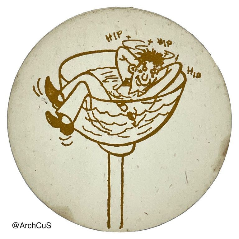 Drink coaster with comic illustration of a drunk man in a cocktail glass