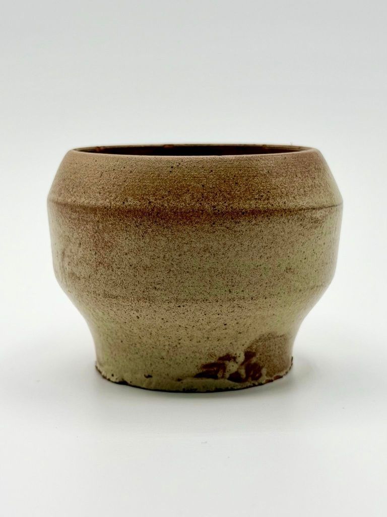 Wheel-thrown stoneware vessel (footed cup/bowl), speckled buff glaze