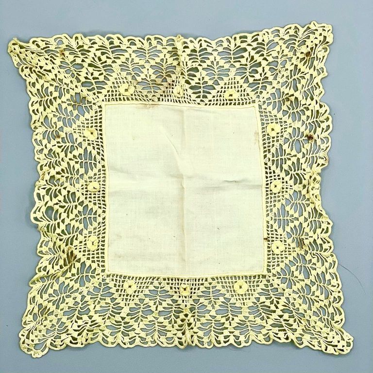 Crochet-bordered square textile (handkerchief or small doily), yellow