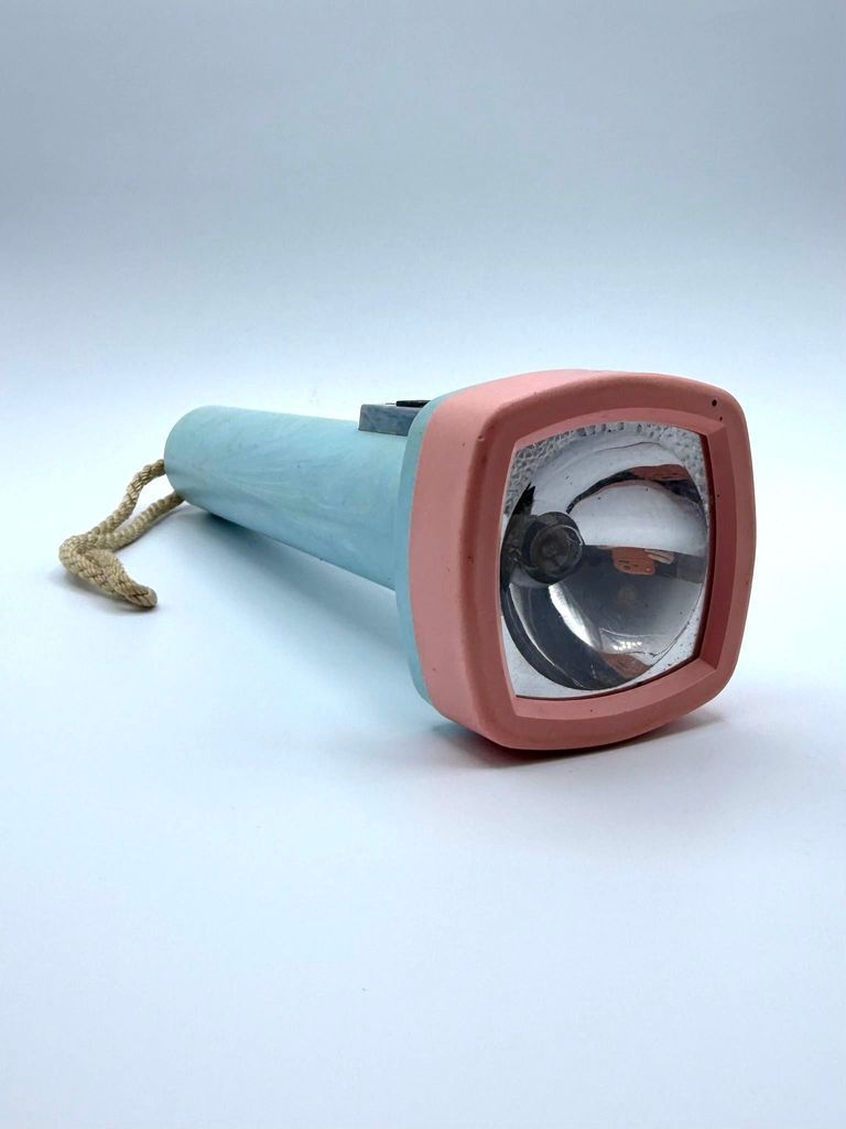 Pocket flashlight (torch) — marbled blue plastic with pink bezel