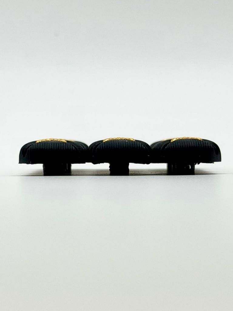 Set of twelve matching square buttons, black with golden "X" motif - Image 3