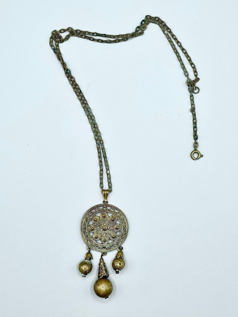 Name Pendant necklace with openwork floral medallion and bead drops