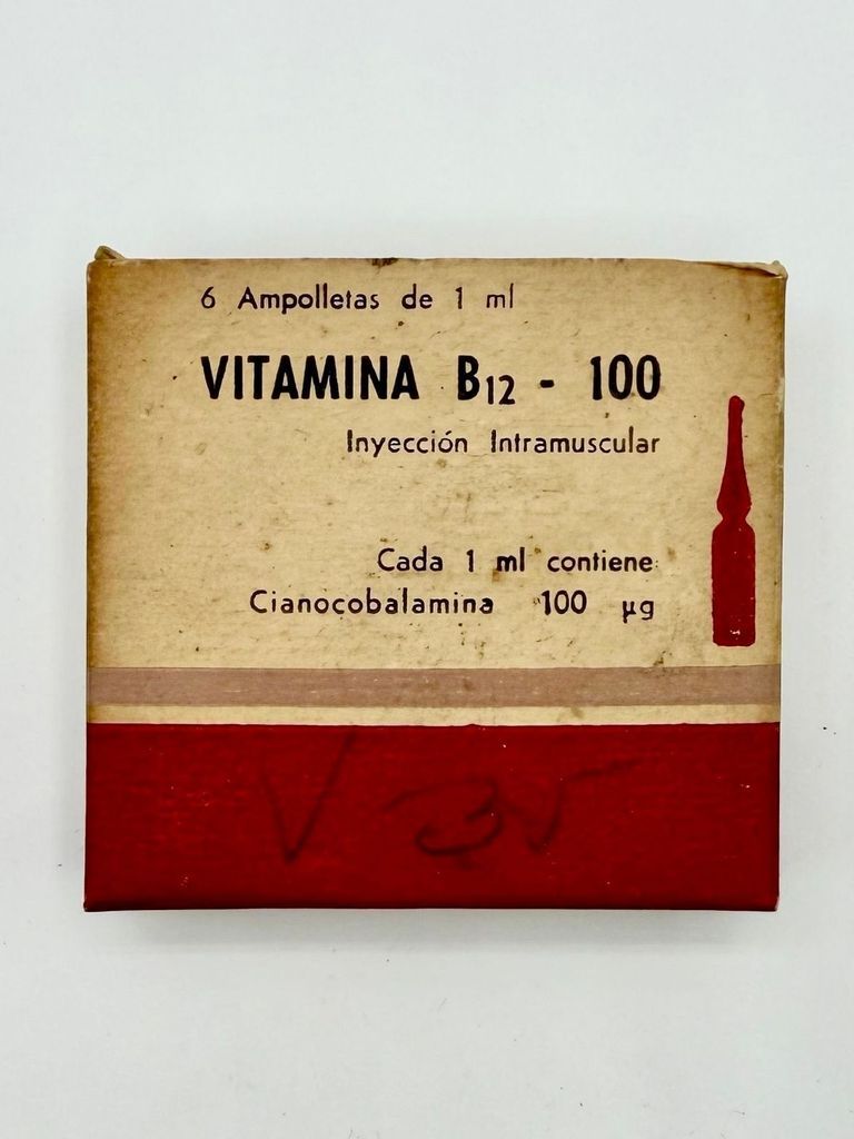 Vitamina B12-100 (cyanocobalamin) intramuscular injection — paperboard box with one surviving ampoule