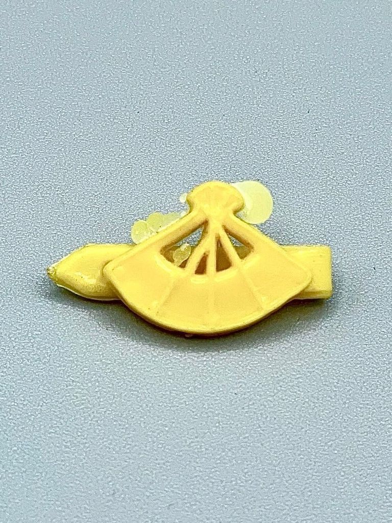 Molded-plastic toddler's hair barrette (fan motif, yellow)