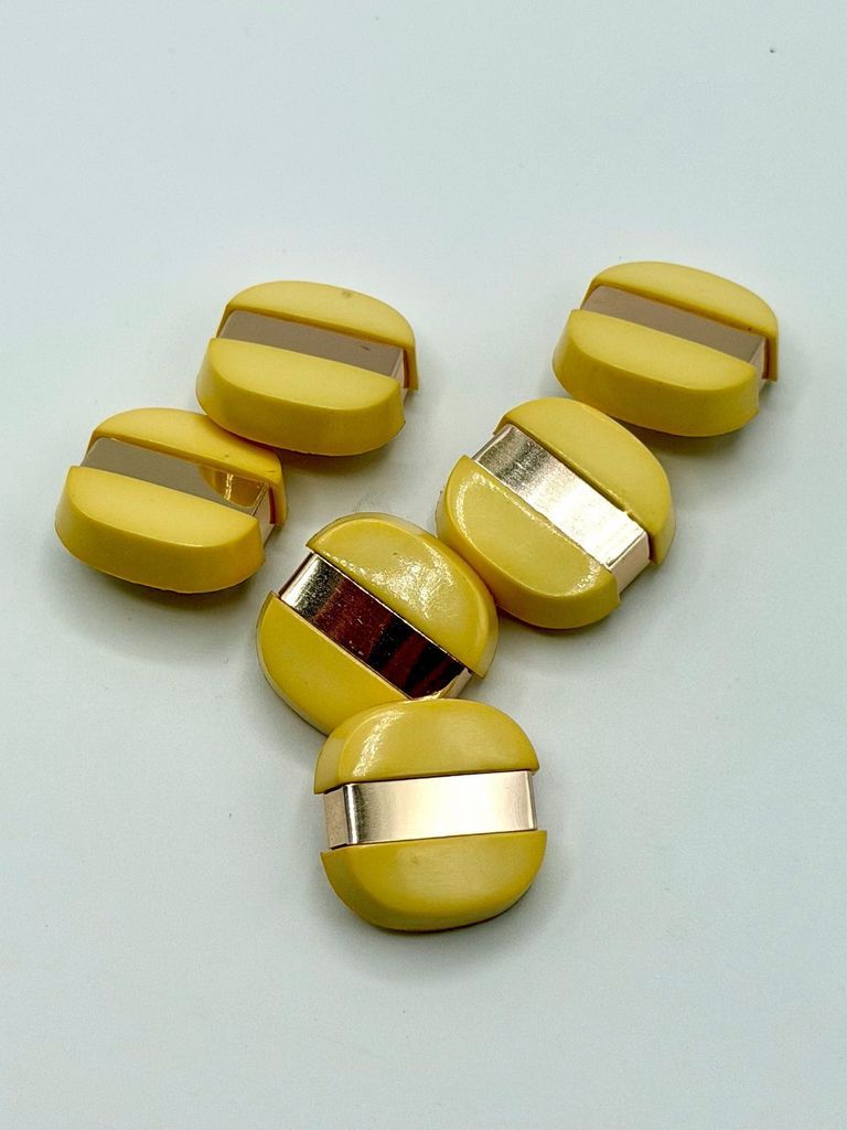 Buttons (set), yellow plastic with gold-tone metal rim