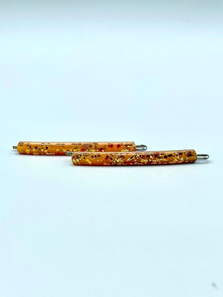 Confetti-lucite "Flower Brand" hair pins (amber/gold, pair), on original card