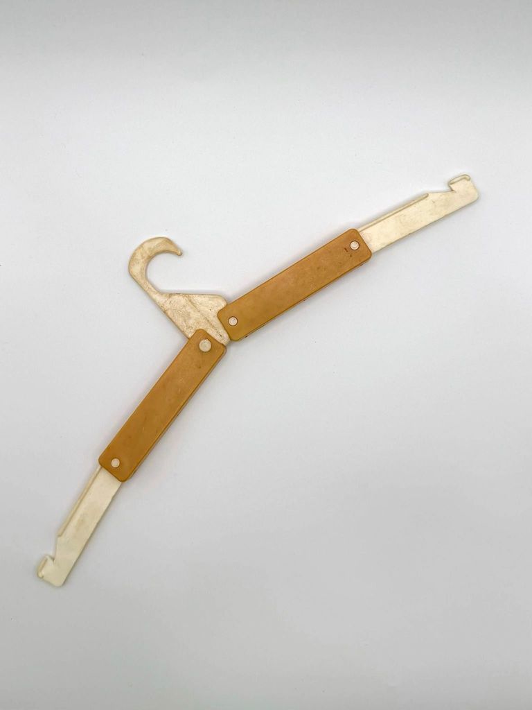 Folding (collapsible) travel clothes hanger