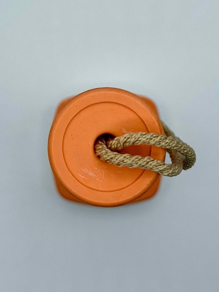 Pocket flashlight (torch) — marbled orange plastic with cream head - Image 2