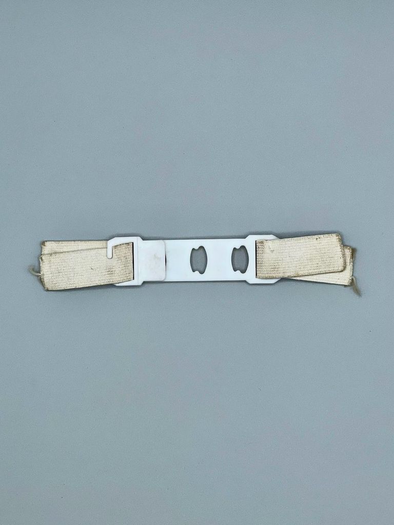 Brassiere strap component, elastic with plastic slide-and-hook adjuster