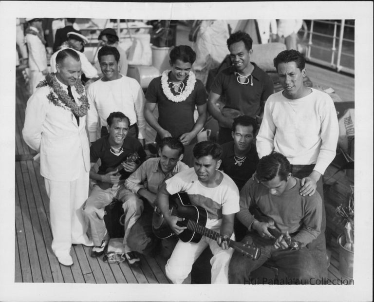 Left to right: William T. Miller, Superintendent of airways, U.S. Dept. of Commerces Bureau of Aeronautics; Luther Waiwaiole, William Yomes, Solomon Kalama, Georger Kahanu. Sitting l-r: Henry Mahikoa, James Carroll, Henry Ohumukini, Joseph Kim, Alex Kahapea picture number 1