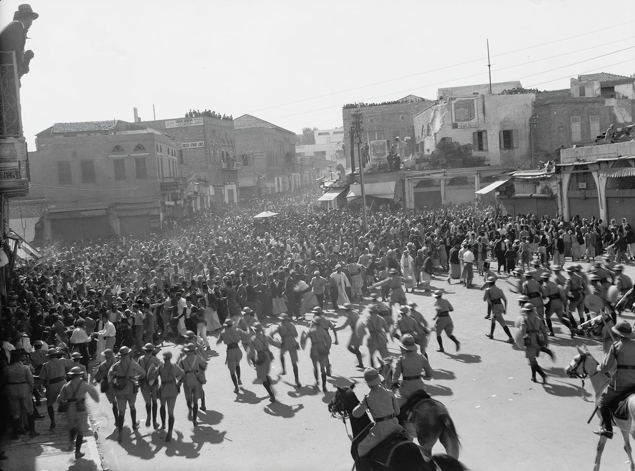 Arab demonstrators facing baton charge by occupying British troops near Jaffa Gate, Jerusalem picture number 1