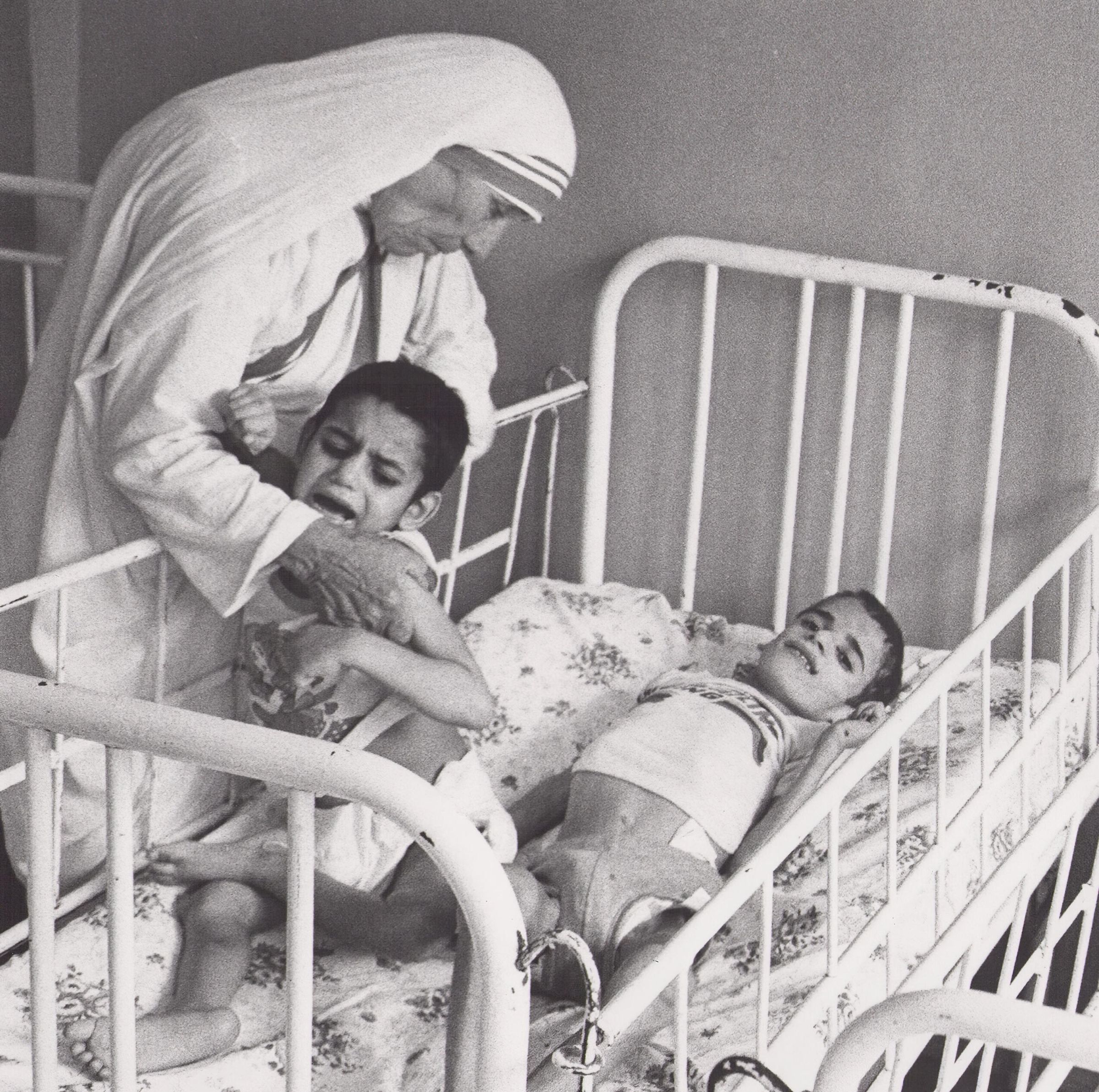 Mother Teresa with two children in Gaza hospital, Beirut Lebanon picture number 1