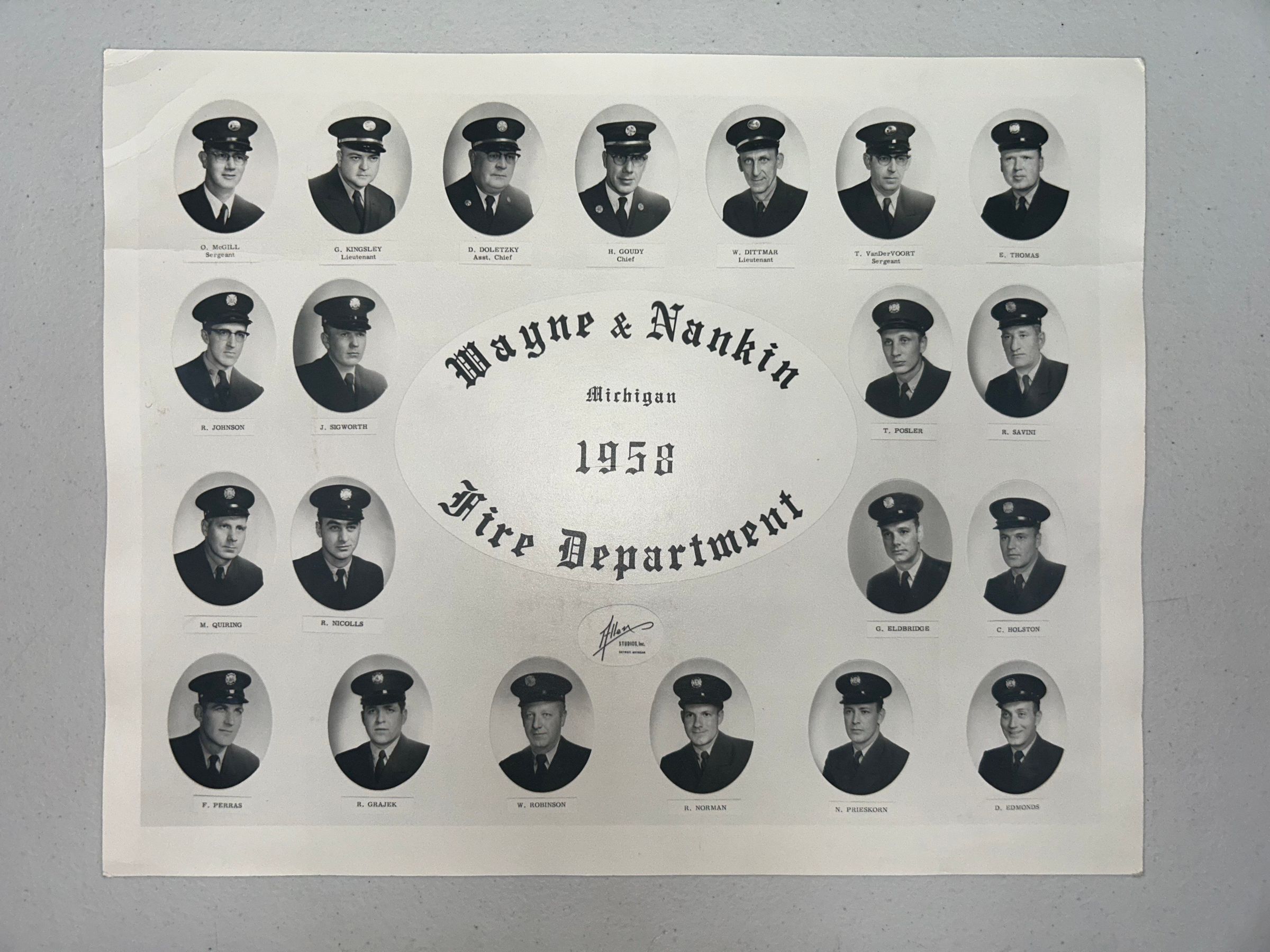 Left to right top row: O. McGill (Sergeant), G. Kingsley (Lieutenant ), D. Dolestzy (Asst. Cheif), H. Goudy (Chief), W. Dittmar (Lieutenant), T. VanDerVOORT (Sergeant), E. Thomas. Middle row: R. Johnson, J. Sigworth, T. Posler, R. Savini, M. Quiring, R. Nicolls, G. Eldbridge, C. Holston. Bottom row: F. Perras, R. Grajek, W. Robinson, R. Norman, N. Prieskorn, D. Edmonds.