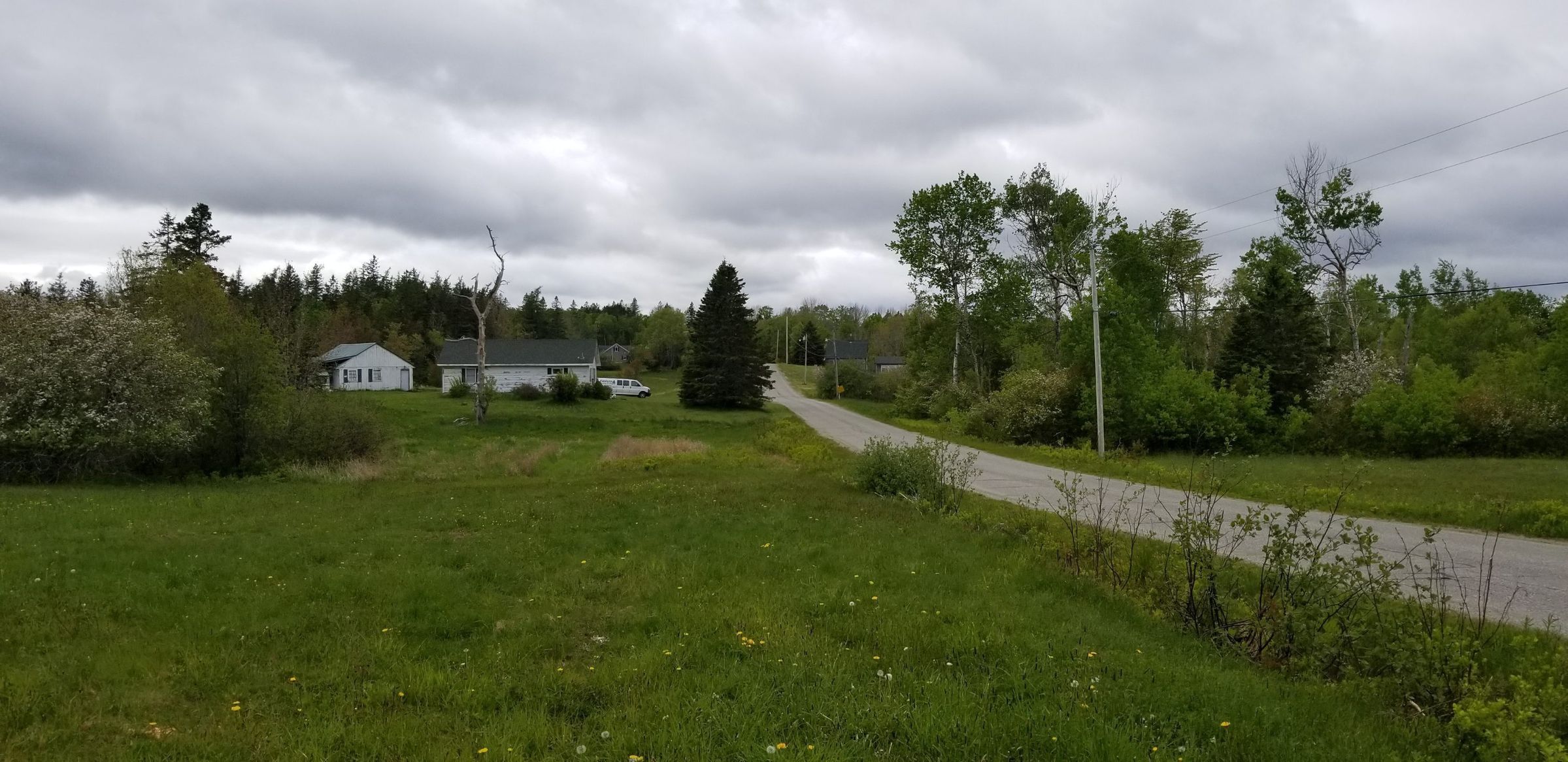 Modern Views South Edmunds Road, Edmunds, Maine; At left is the replacement house for the Mary and Robert Hallowell house that burned in August 1974. Above it and to the right of the road is the Capt. Ralph Hallowell H-house.